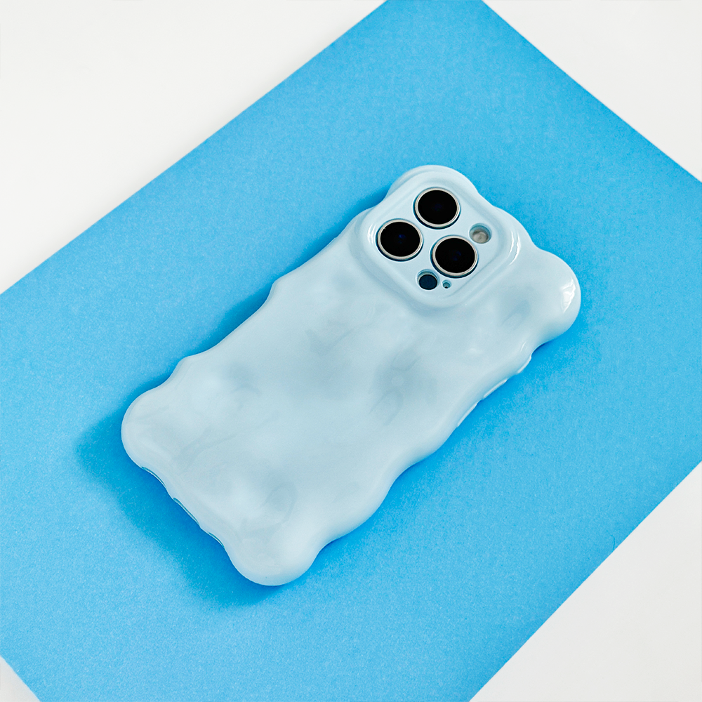 Baby blue 3D bubble phone case from Coconut Lane on a blue and white background.