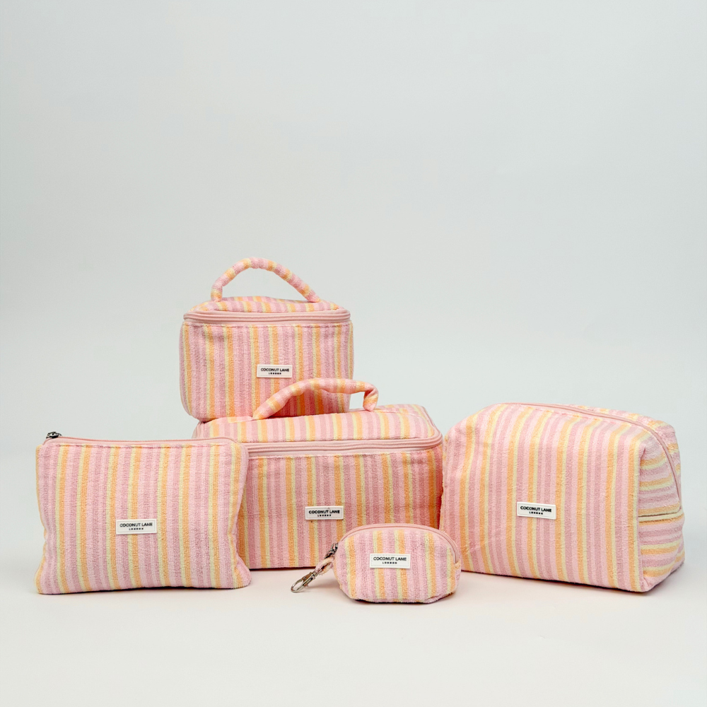 Group image of pastel stripe makeup bags
