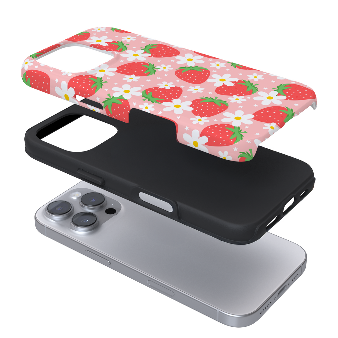 Expanded view of a pink phone case with a strawberry pattern on a white background