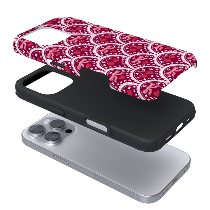 Expanded view of a phone case with a cherry lace pattern on a white background