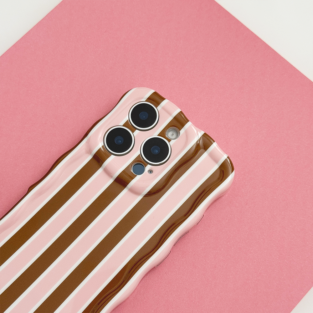 Close-up of Cocoa & Pink Stripe Wavy Phone Case showing the glossy striped design, triple camera cutouts and wavy edges.