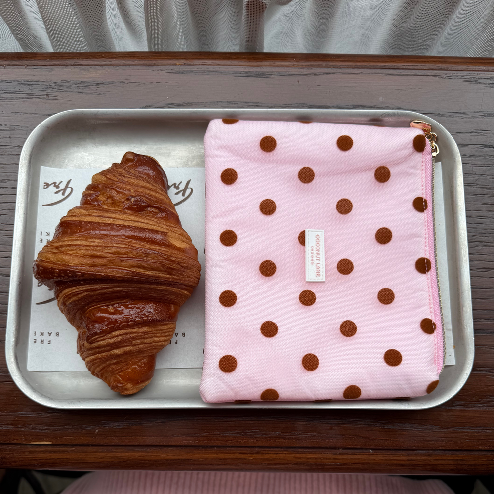 Dot Society Pink and Brown Everything Pouch. The pouch is sheer mesh material with brown polka dot detailing. 