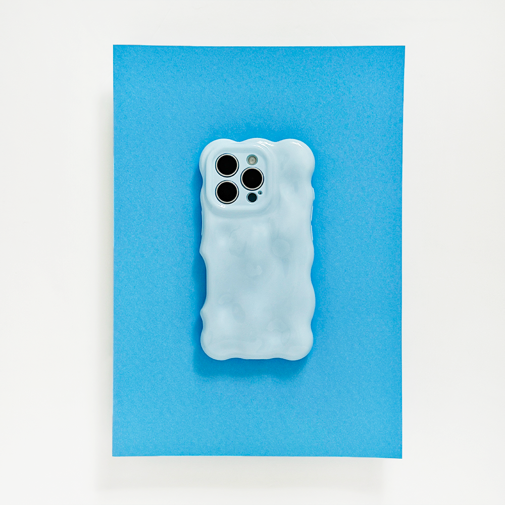 Baby blue Coconut Lane 3D bubble phone case on a blue sheet with a white background.