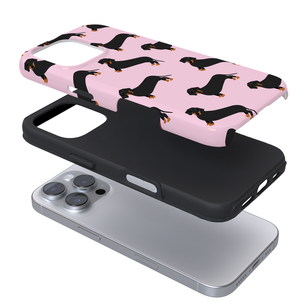 Expanded view of a pink phone case with a dachshund design on a white background