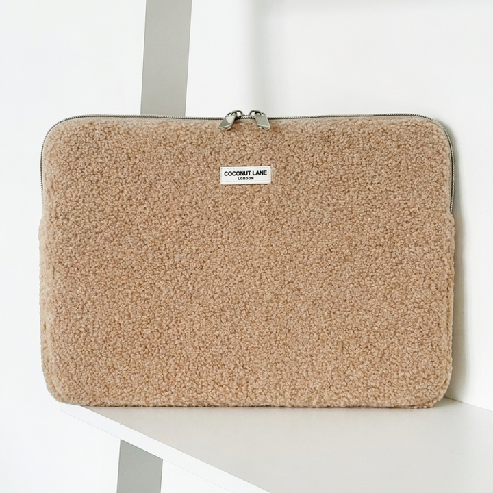 Teddy boucle brown textured Laptop Sleeve with zip closure and Coconut Lane logo. 