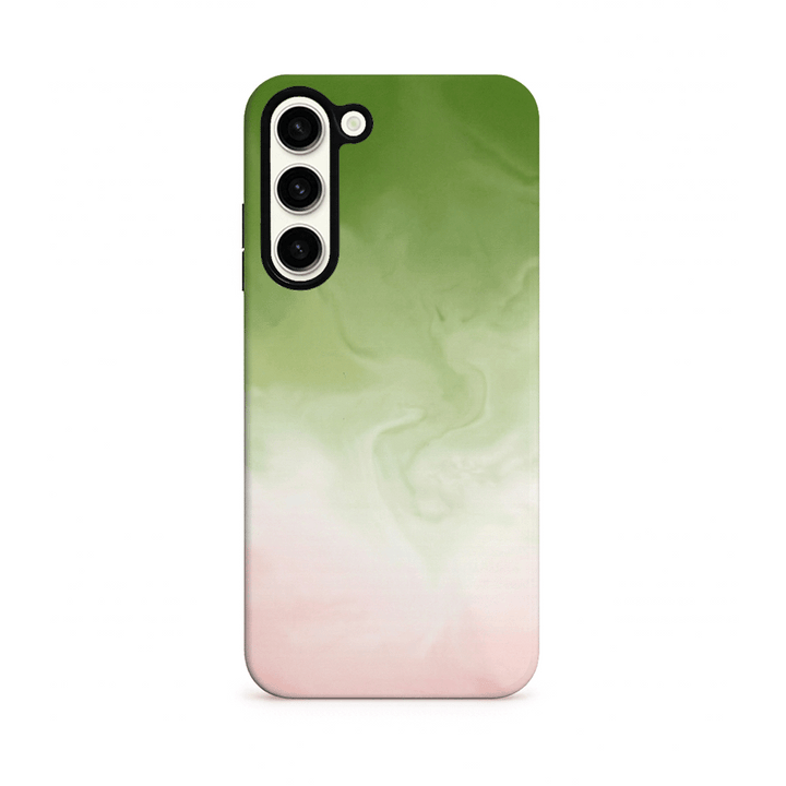 Phone case with a gradient design transitioning from green to pink on a white background.