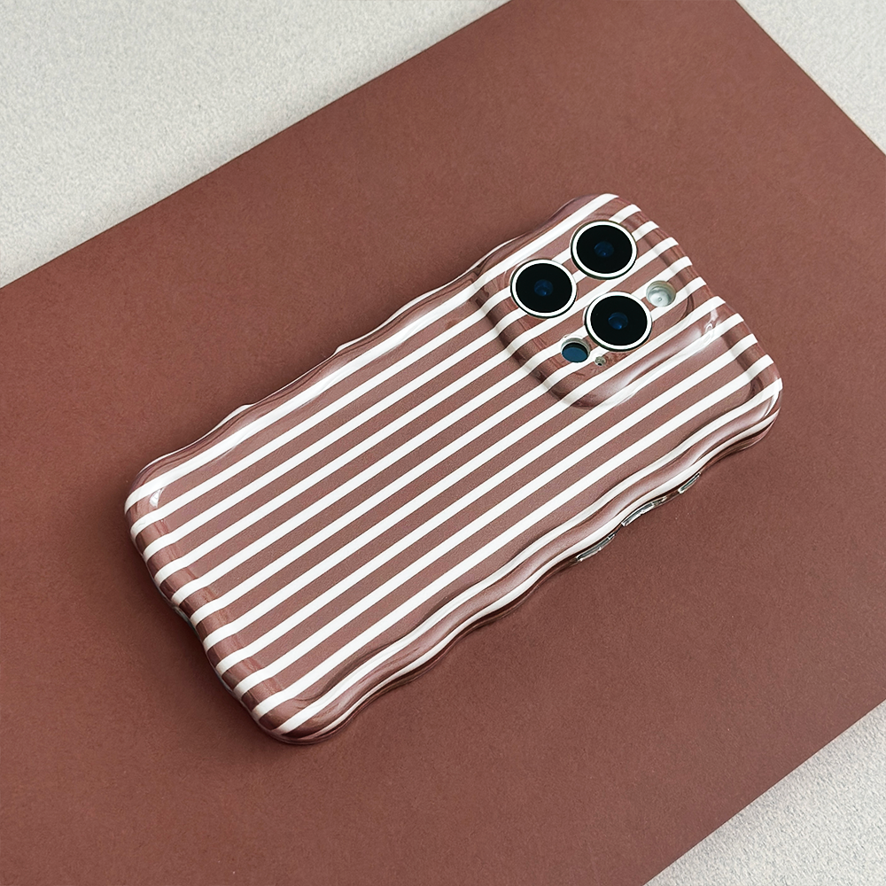 Chestnut striped Coconut Lane wavy phone case displayed with a smartphone on a matching brown background.