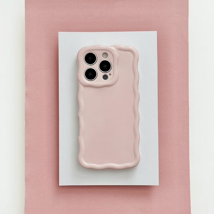 Plain baby pink coloured Phone Case with wavy edge effect.