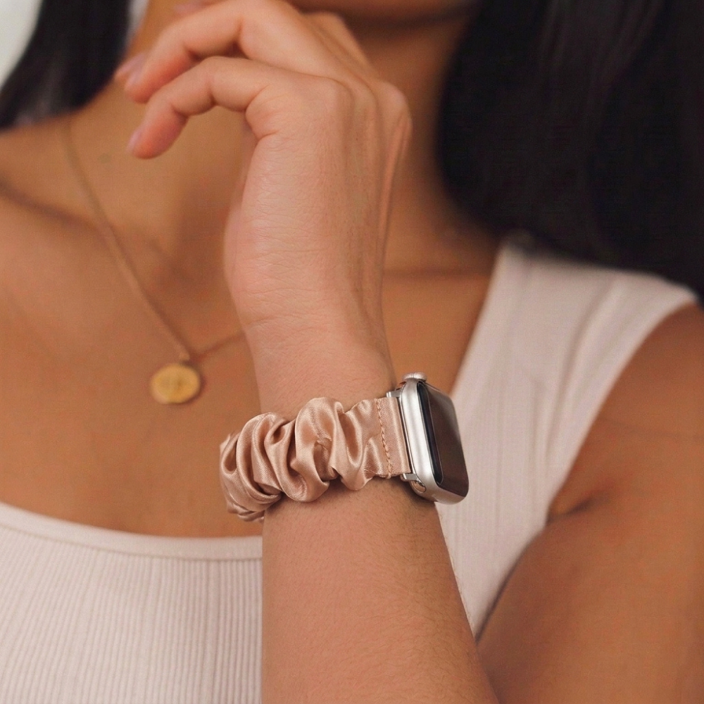 Girl wearing scrunchie watch strap caramel latte