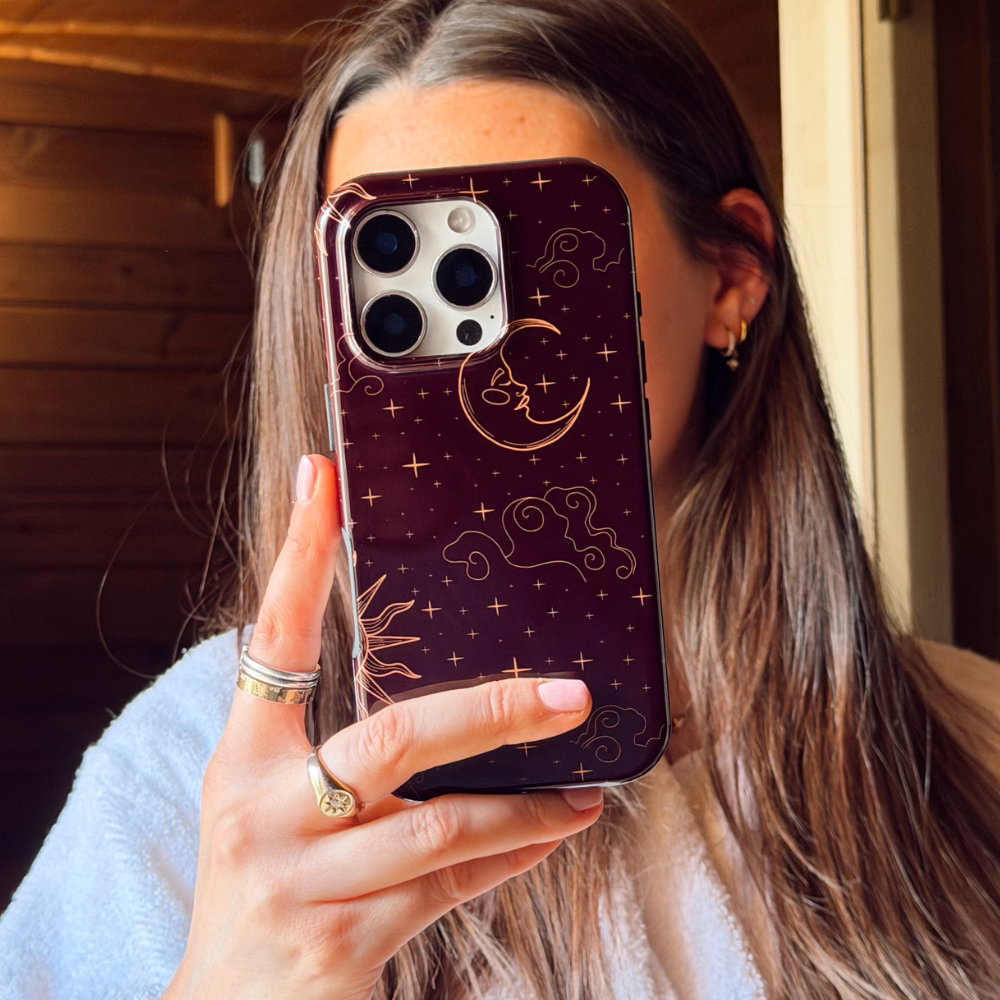 girl holding tough magsafe celestial phone case